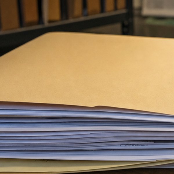 House exterior with legal documents overlay — detail