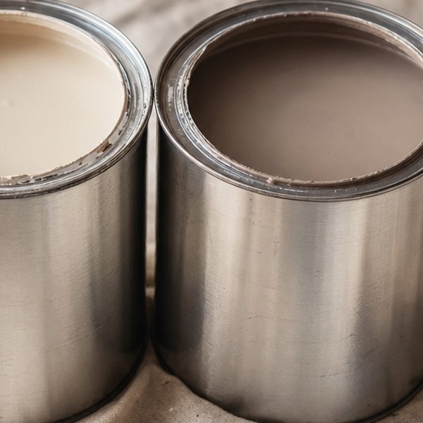 Two paint tins with visible color difference gap — detail
