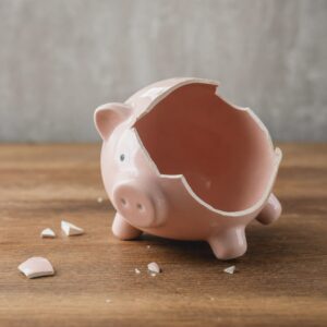 Empty piggy bank symbolizing depleted savings